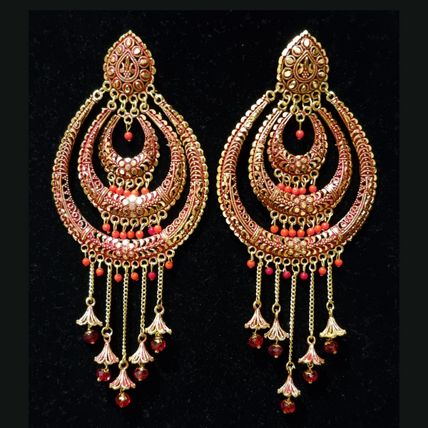 Long jhumka style earrings with tassels.