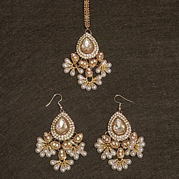 Traditional diamond cut stones and pearl  earrings, tikka set