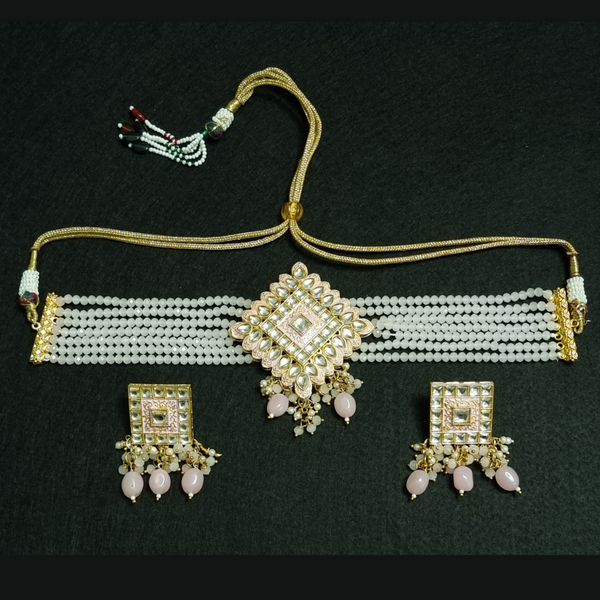 Kundan pink moti choker necklace with earrings.