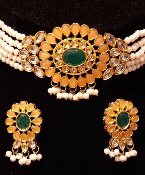 Kundan stones pearl choker necklace with earrings.