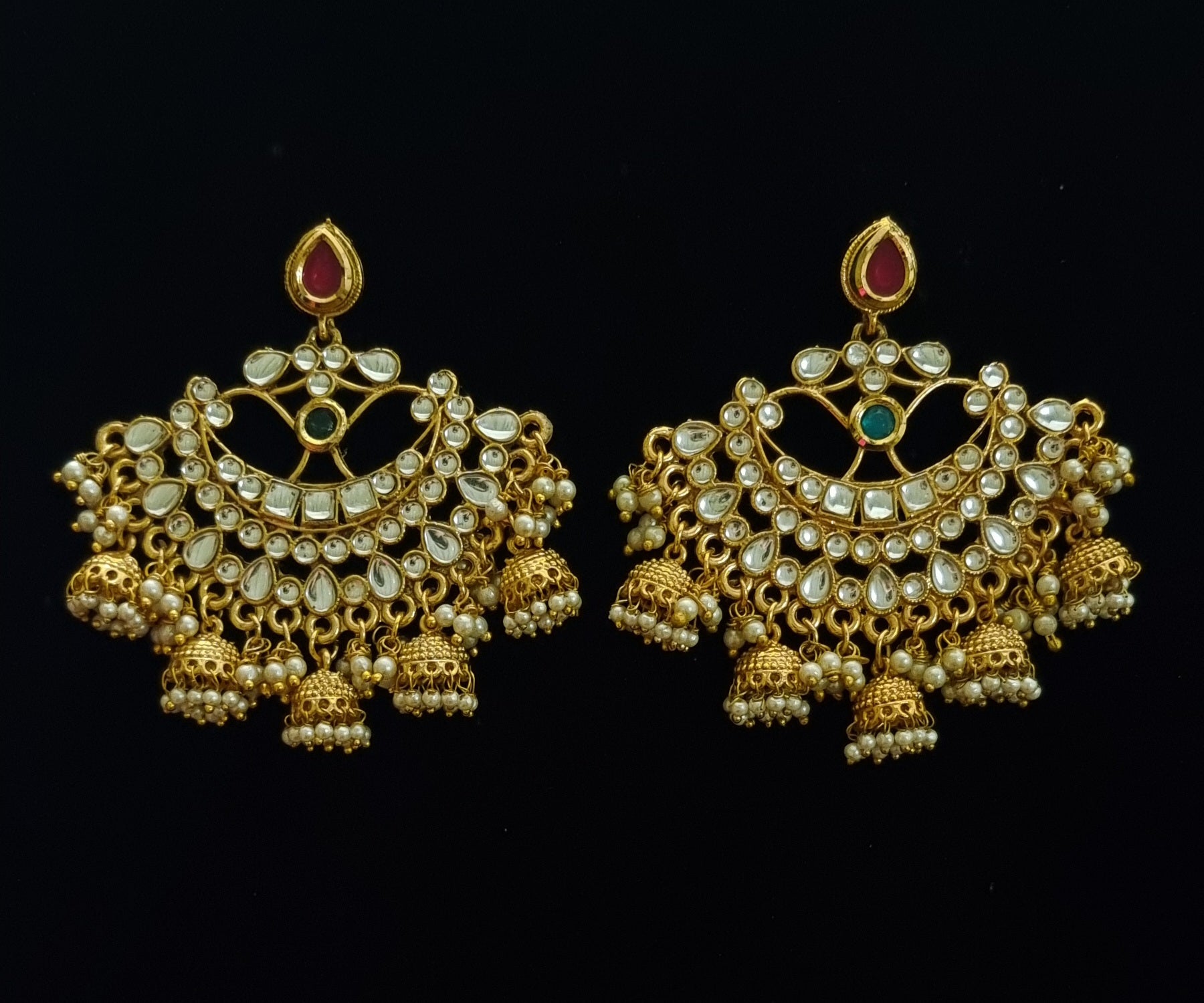 Gold plated chandbali with kundan and jhumkis.