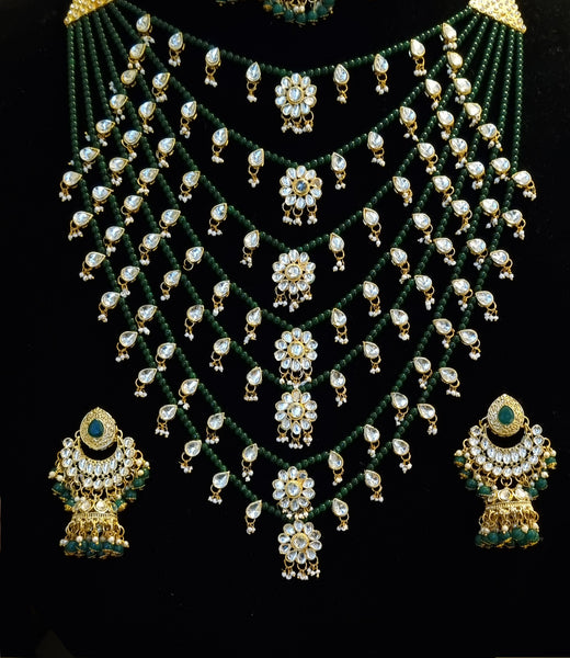 Designer kundan gold plated emerald bridal set.