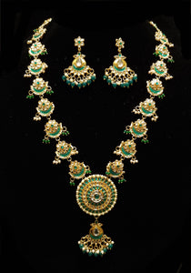 Golden and green  Traditional Designer Pacchi Kundan Long Necklace Set.