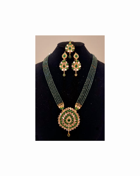 Maharaani kundan polki haar with earrings.