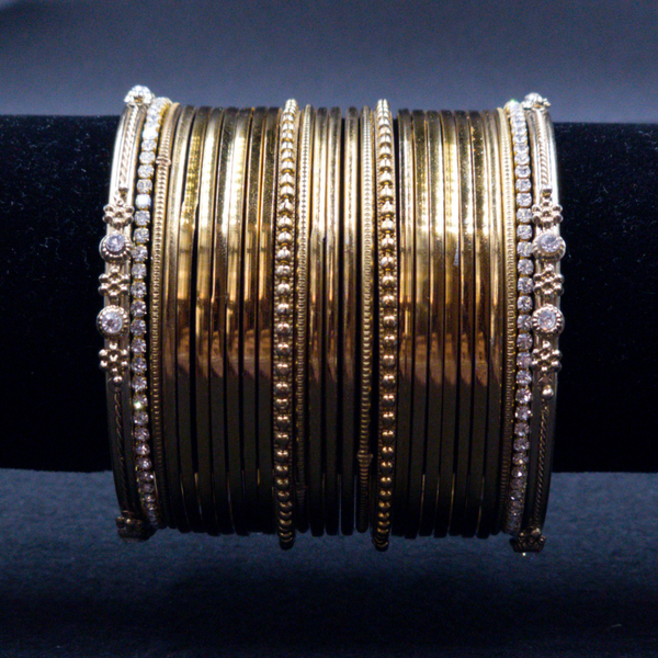 Designer Stone studed metal bangle set. ( 2.6 )