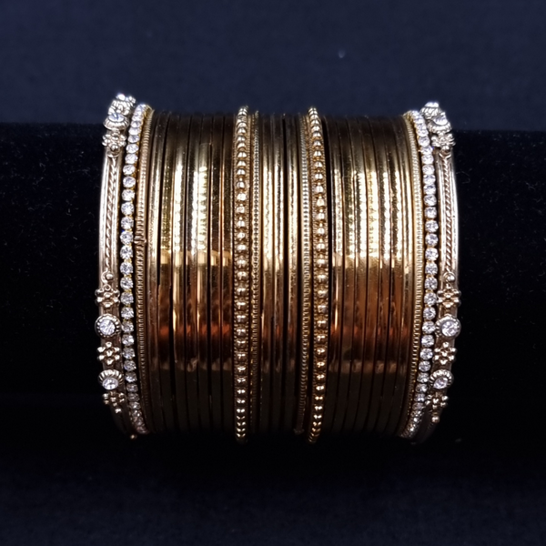 Designer Stone studed metal bangle set. ( 2.6 )