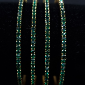 Designer rhinestone metal bangles.