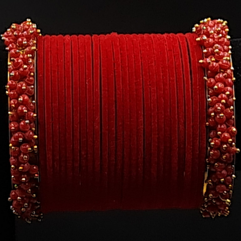 Red velvet bangles set with red pearl kadas