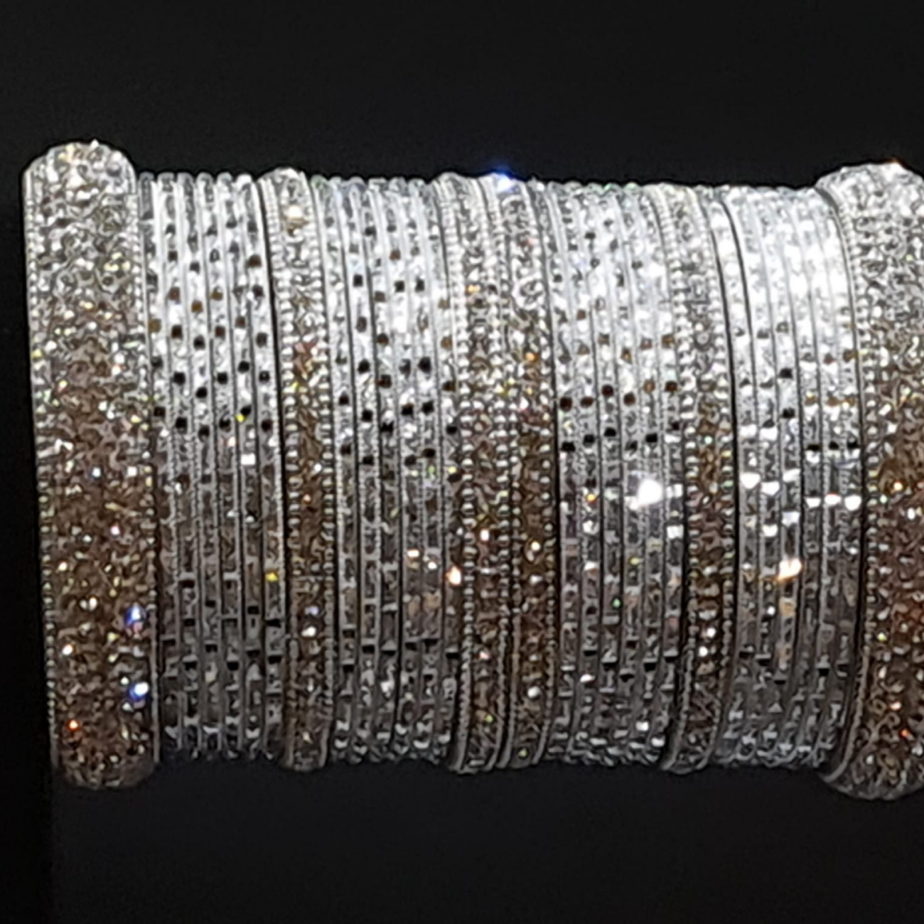 Silver bangles set with silver stone kangan