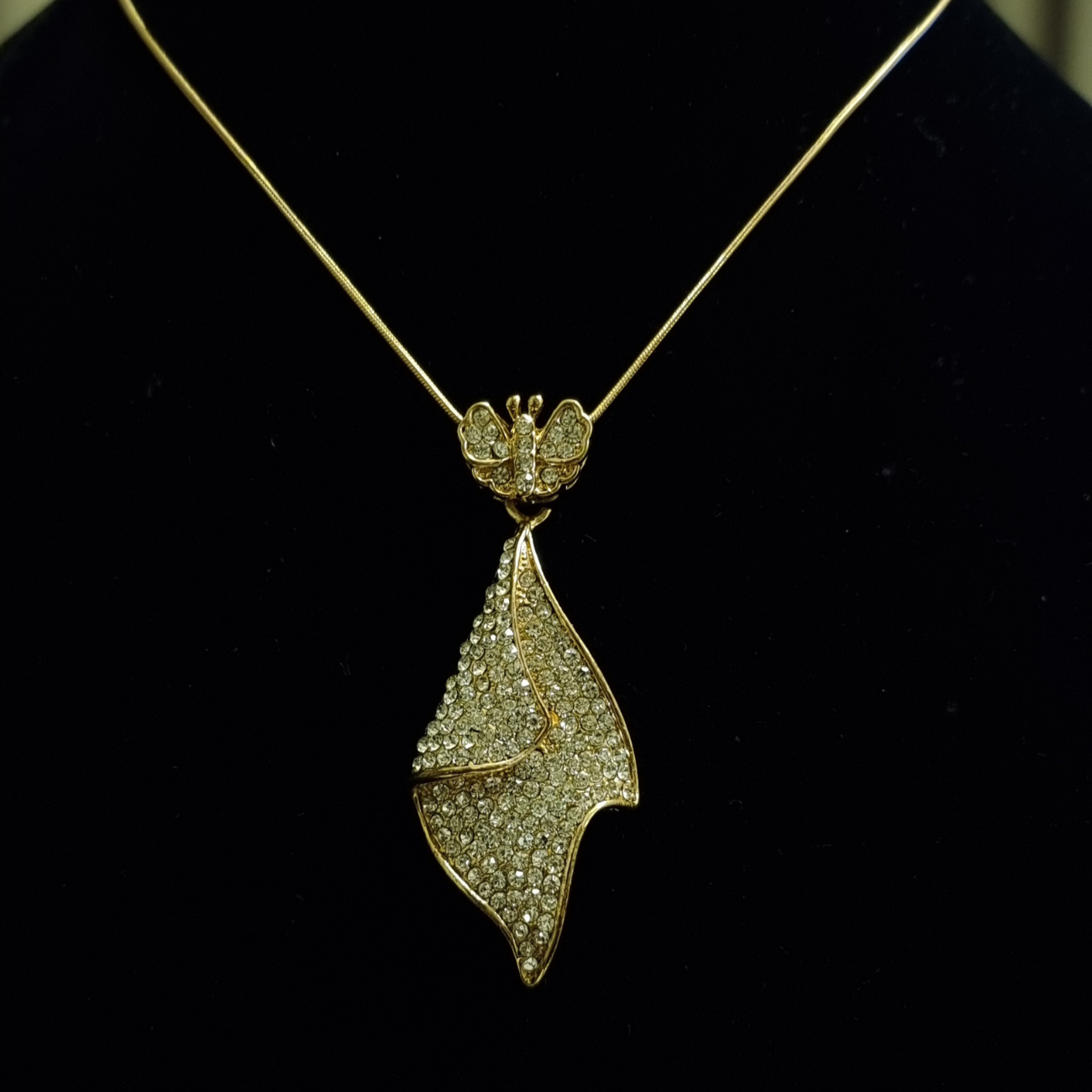 Stone stud gold plated pendant