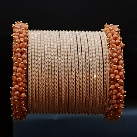 New stylish peach bangles with peach blush beaded gagra churi